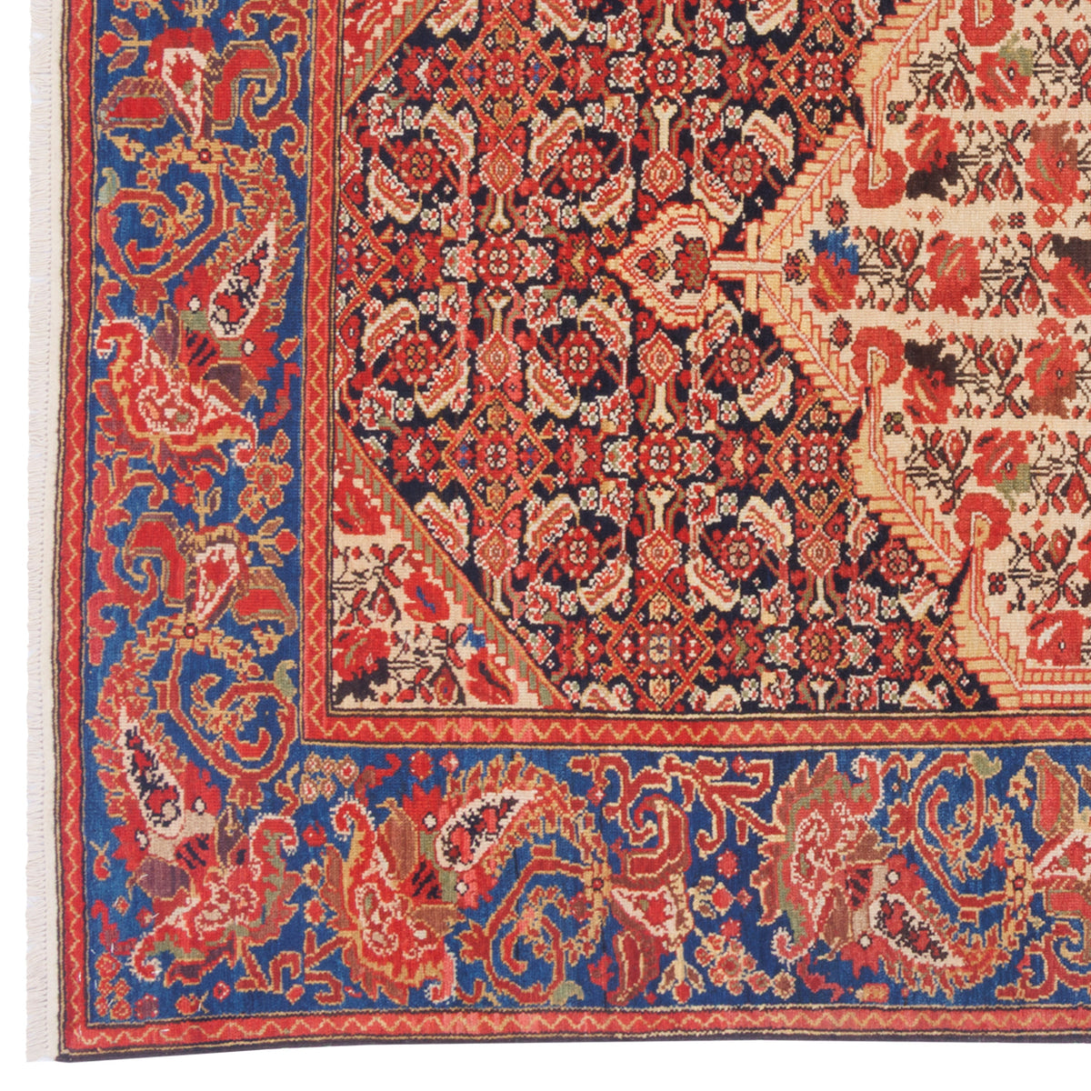Corner of a Malayer handmade carpet with an all-over design and wide border
