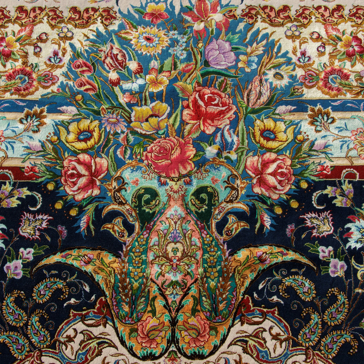 Close-up of the floral drawing on a Tabriz handmade carpet in wool and silk on a silk warp